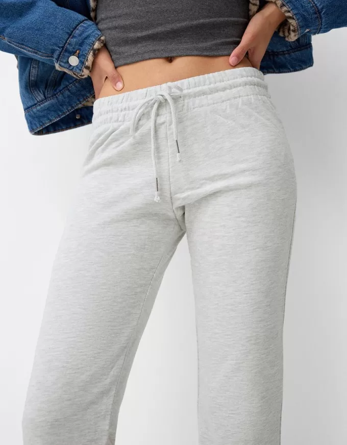 Pantaloni evazați de pluș Pantaloni evazați de pluș