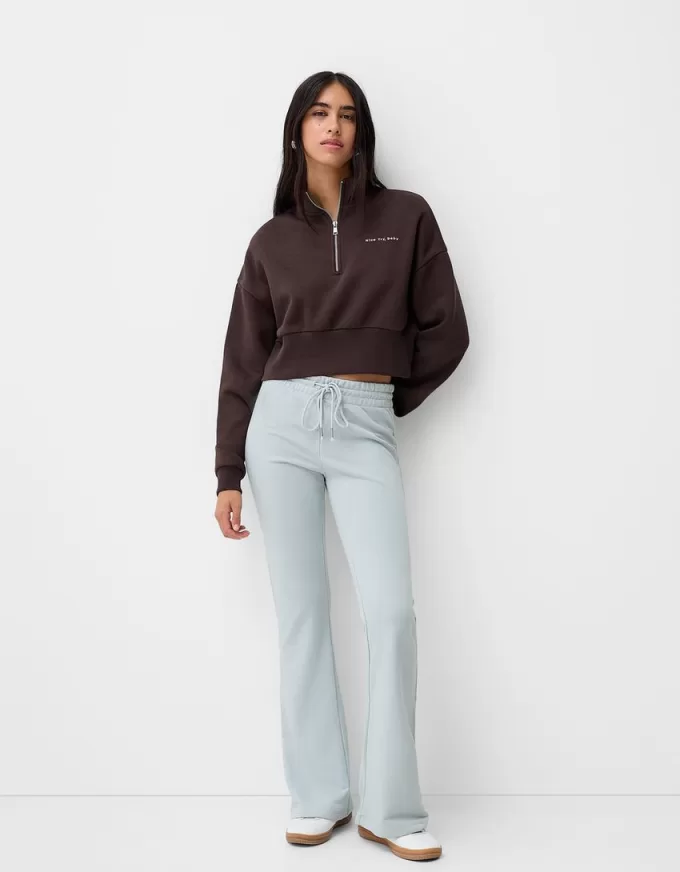 Pantaloni evazați de pluș Pantaloni evazați de pluș