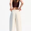 Pantaloni fluidi cu darts