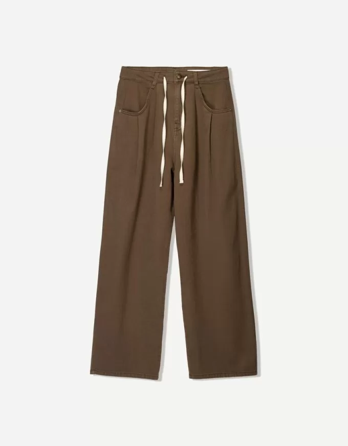 Pantaloni fluidi cu darts