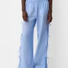 Pantaloni fluidi cu legături laterale Pantaloni fluidi cu legături laterale