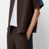 Pantaloni largi cu dungi laterale Pantaloni largi cu dungi laterale