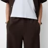 Pantaloni largi cu dungi laterale Pantaloni largi cu dungi laterale