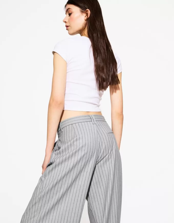 Pantaloni largi cu talie joasă Pantaloni largi cu talie joasă
