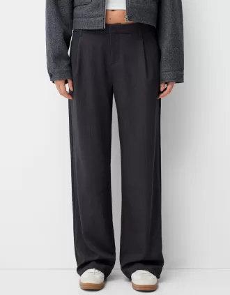 Pantaloni largi cu talie joasă