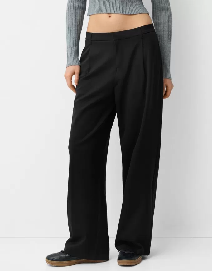 Pantaloni largi cu talie joasă Pantaloni largi cu talie joasă