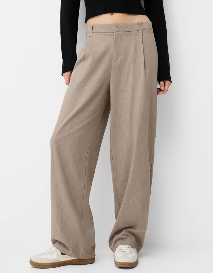 Pantaloni largi cu talie joasă Pantaloni largi cu talie joasă