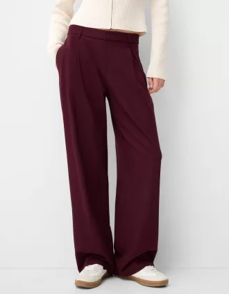 Pantaloni largi cu talie joasă