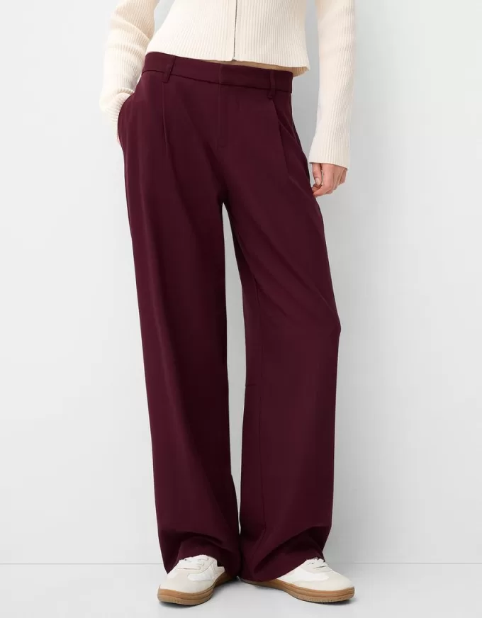 Pantaloni largi cu talie joasă Pantaloni largi cu talie joasă