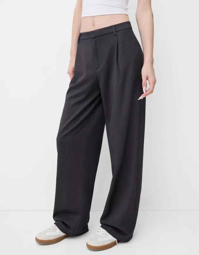 Pantaloni largi cu talie joasă Pantaloni largi cu talie joasă