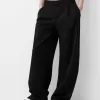 Pantaloni largi cu talie joasă Pantaloni largi cu talie joasă