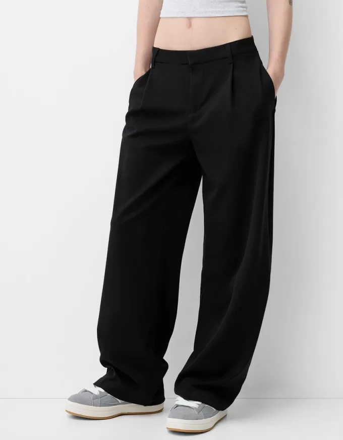 Pantaloni largi cu talie joasă Pantaloni largi cu talie joasă