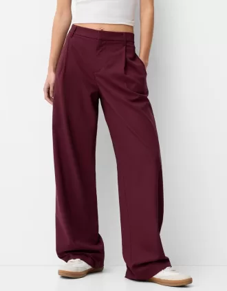 Pantaloni largi cu talie joasă