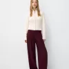 Pantaloni largi cu talie joasă Pantaloni largi cu talie joasă