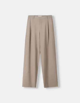 Pantaloni largi cu talie joasă