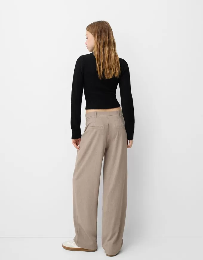 Pantaloni largi cu talie joasă Pantaloni largi cu talie joasă