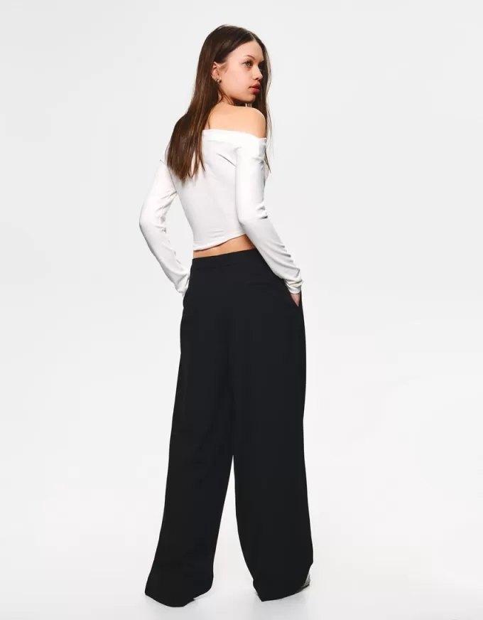 Pantaloni largi cu talie joasă Pantaloni largi cu talie joasă
