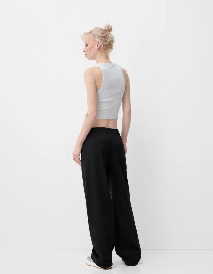 Pantaloni largi cu talie joasă Pantaloni largi cu talie joasă