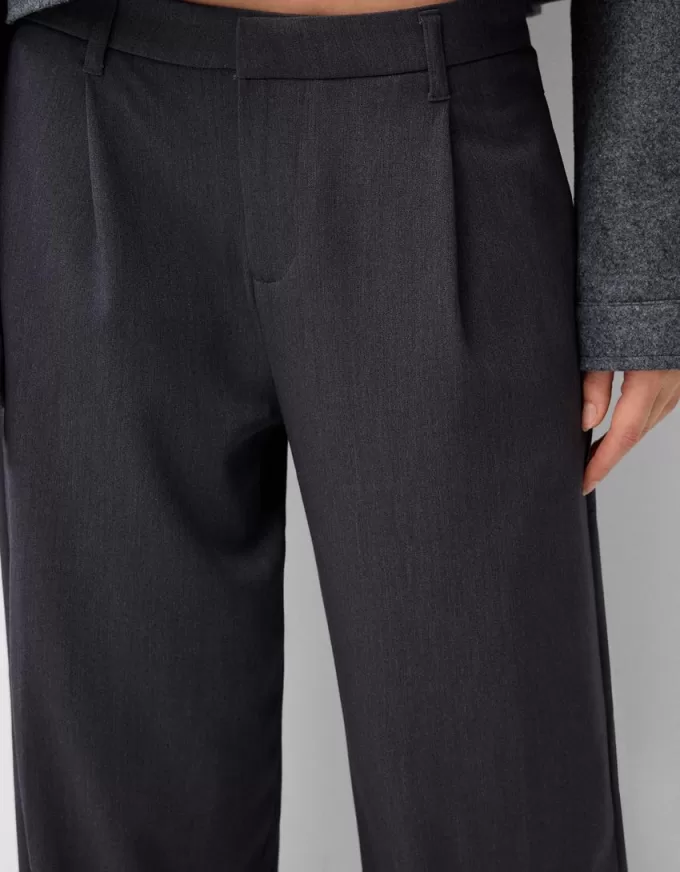 Pantaloni largi cu talie joasă Pantaloni largi cu talie joasă