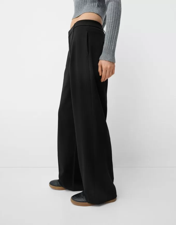 Pantaloni largi cu talie joasă Pantaloni largi cu talie joasă