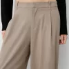 Pantaloni largi cu talie joasă Pantaloni largi cu talie joasă