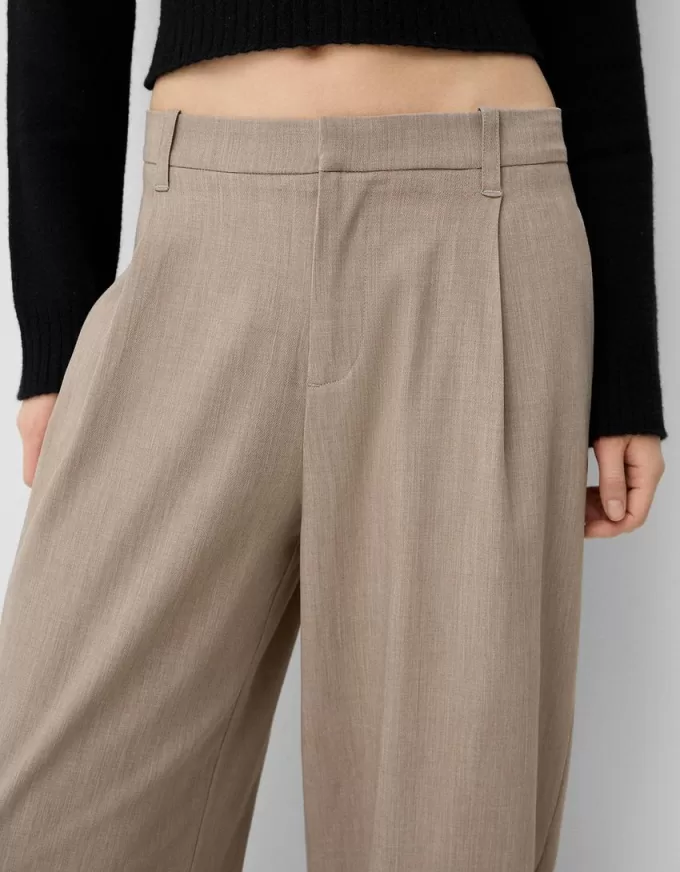 Pantaloni largi cu talie joasă Pantaloni largi cu talie joasă