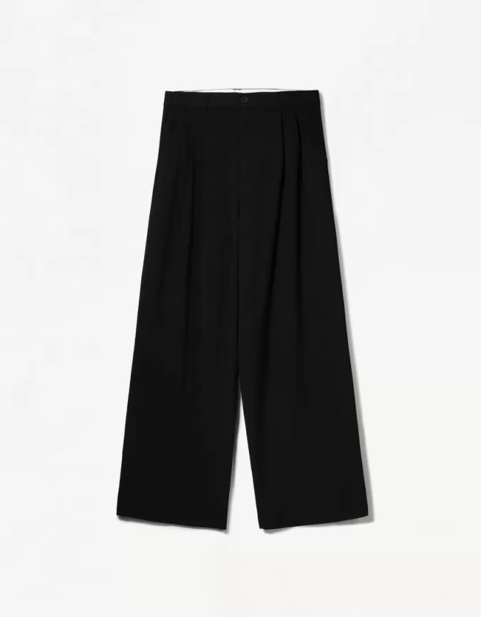 Pantaloni largi cu talie joasă Pantaloni largi cu talie joasă