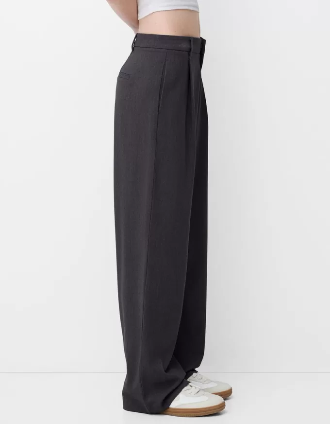 Pantaloni largi cu talie joasă Pantaloni largi cu talie joasă