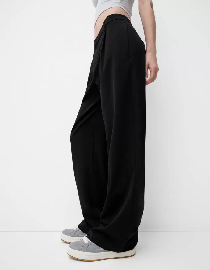 Pantaloni largi cu talie joasă Pantaloni largi cu talie joasă