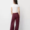 Pantaloni largi cu talie joasă Pantaloni largi cu talie joasă