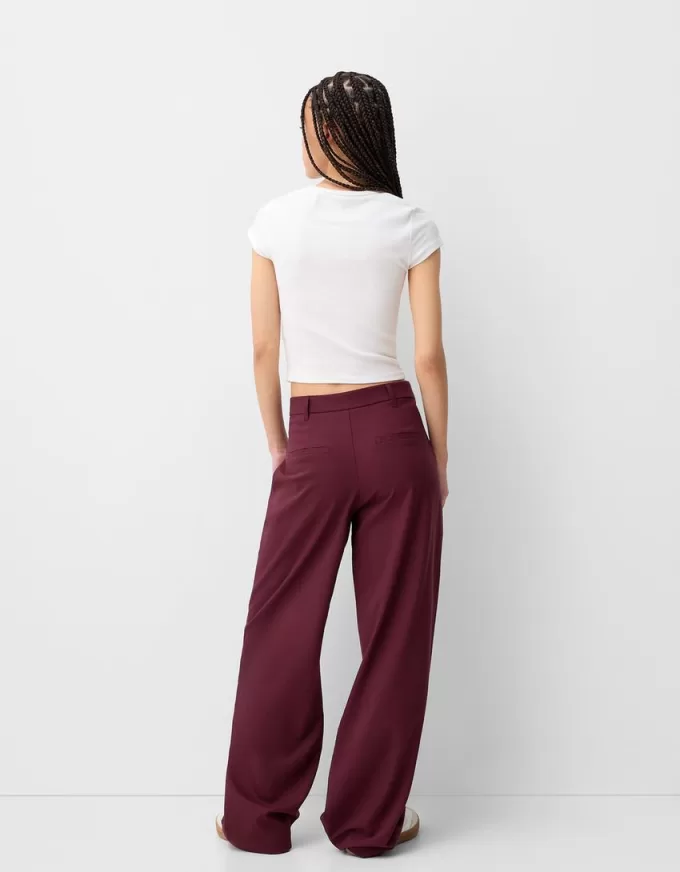 Pantaloni largi cu talie joasă Pantaloni largi cu talie joasă