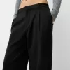 Pantaloni largi cu talie joasă Pantaloni largi cu talie joasă