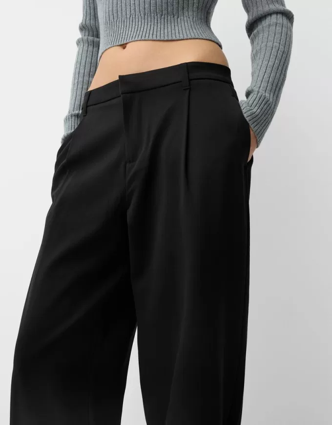 Pantaloni largi cu talie joasă Pantaloni largi cu talie joasă