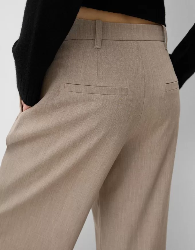 Pantaloni largi cu talie joasă Pantaloni largi cu talie joasă