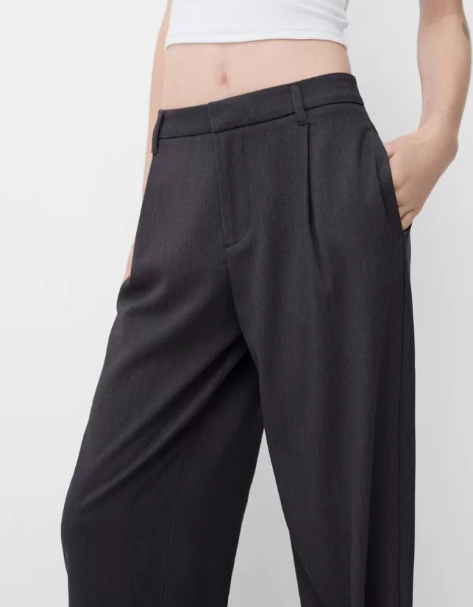 Pantaloni largi cu talie joasă Pantaloni largi cu talie joasă