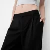 Pantaloni largi cu talie joasă Pantaloni largi cu talie joasă