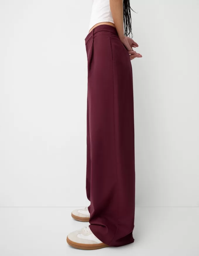 Pantaloni largi cu talie joasă Pantaloni largi cu talie joasă