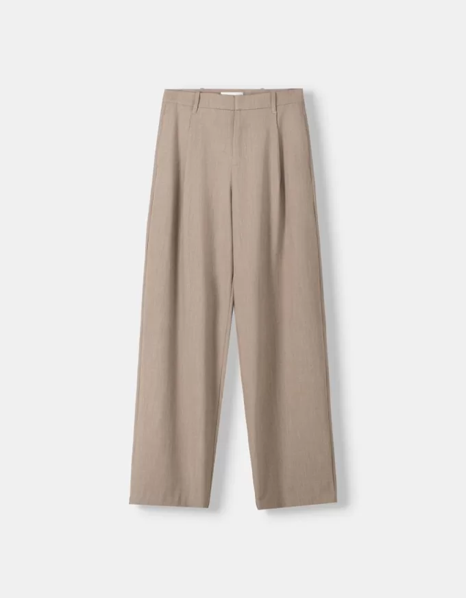 Pantaloni largi cu talie joasă Pantaloni largi cu talie joasă