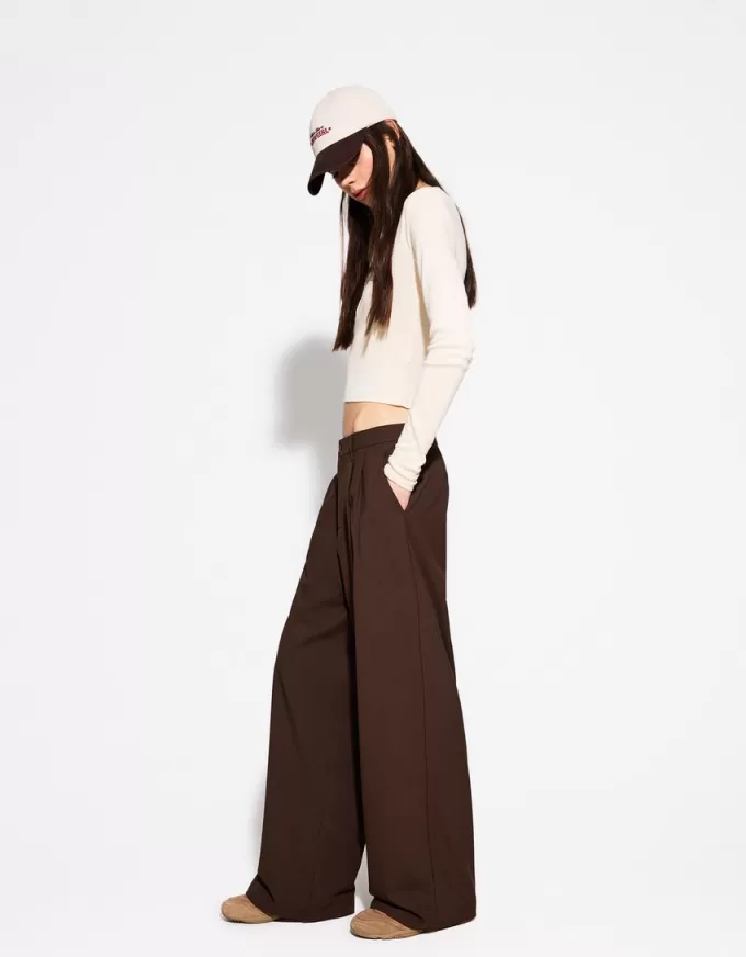 Pantaloni largi cu talie joasă Pantaloni largi cu talie joasă