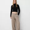 Pantaloni largi cu talie joasă Pantaloni largi cu talie joasă