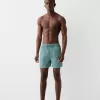 Pantaloni scurți de bord monocromi cu fiti boxy Pantaloni scurți de bord monocromi cu fiti boxy