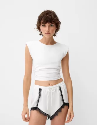 Pantaloni scurți din dantelă din satin