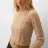 Pulover din chenilia din tricot cablu