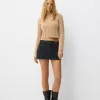 Pulover din chenilia din tricot cablu