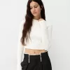 Pulover din tricot cablu cu coaste