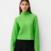 Pulover oversize decupat cu coaste cu gât înalt