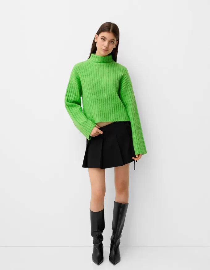Pulover oversize decupat cu coaste cu gât înalt
