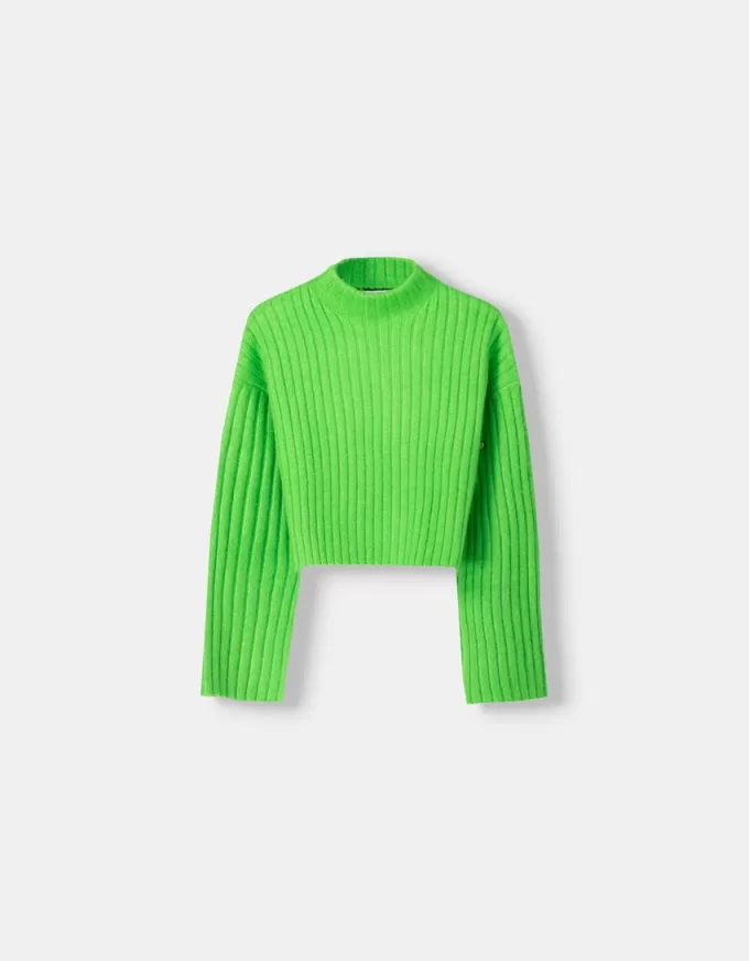 Pulover oversize decupat cu coaste cu gât înalt