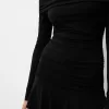 Rochie mini cu maneci lungi cu volane SERIA BERSHKA Rochie mini cu maneci lungi cu volane SERIA BERSHKA
