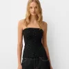 Top bandeau cu bijuterie
